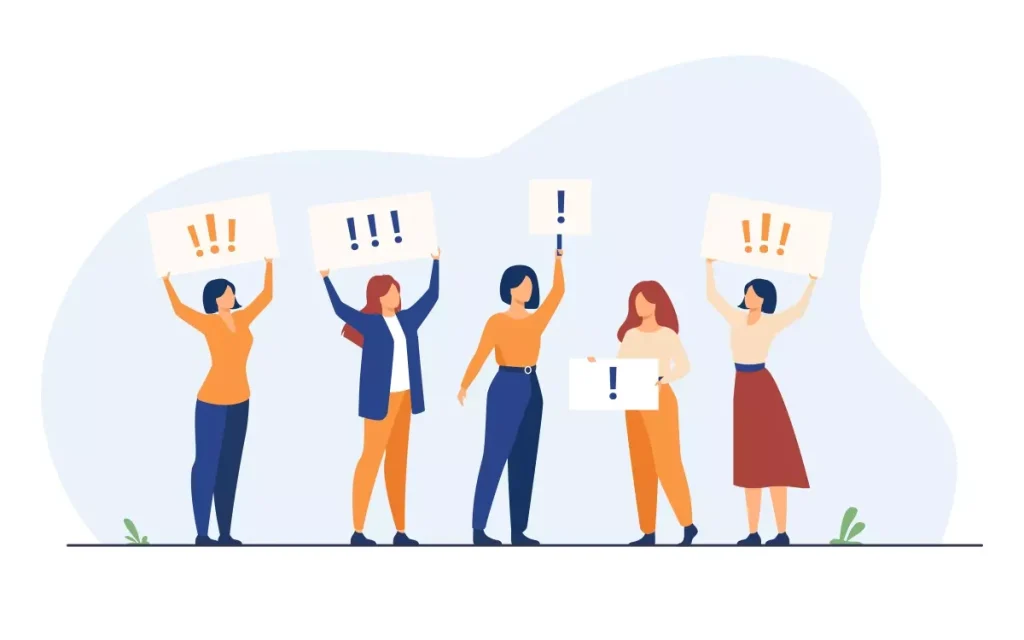 Trabalhador intermitente pode participar de sindicato, como ilustrado por pessoas segurando sinais com pontos de exclamação, representando direitos e representatividade.