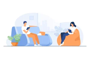 Pessoa relaxando em casa durante as férias no trabalho intermitente, aproveitando momento de descanso e lazer com seus dispositivos.