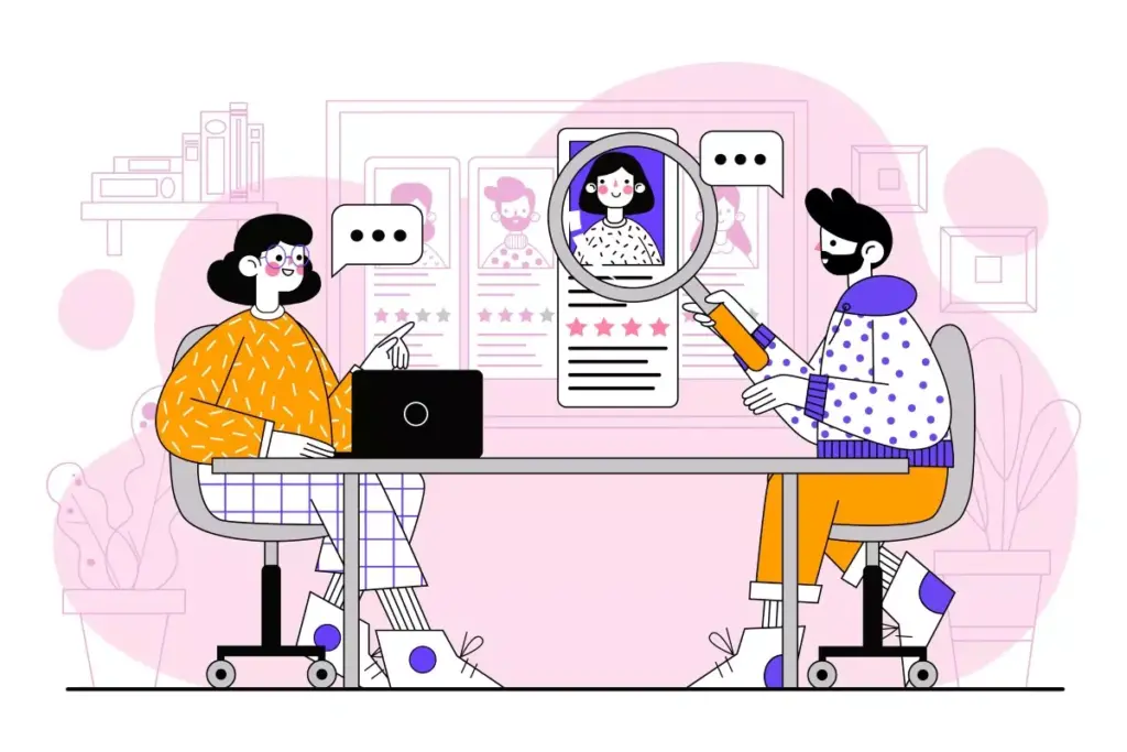 Imagem demonstrando uma entrevista de contratação de trabalho intermitente, com duas pessoas em uma mesa de reuniões utilizando computador e celular.