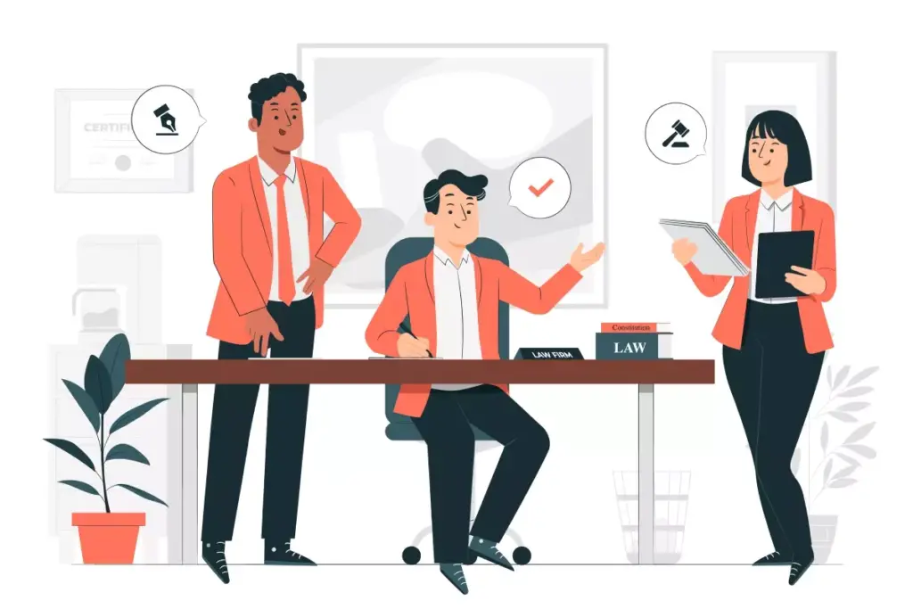 Imagem de três pessoas discutindo direitos no trabalho intermitente, uma delas sentada e usando um computador, enquanto as outras duas conversam ao lado. Representa diálogo e negociação de direitos trabalhistas.